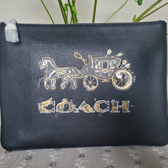 Coach Large Wristlet with Chelsea Champlain Animation - Picture 1 of 5
